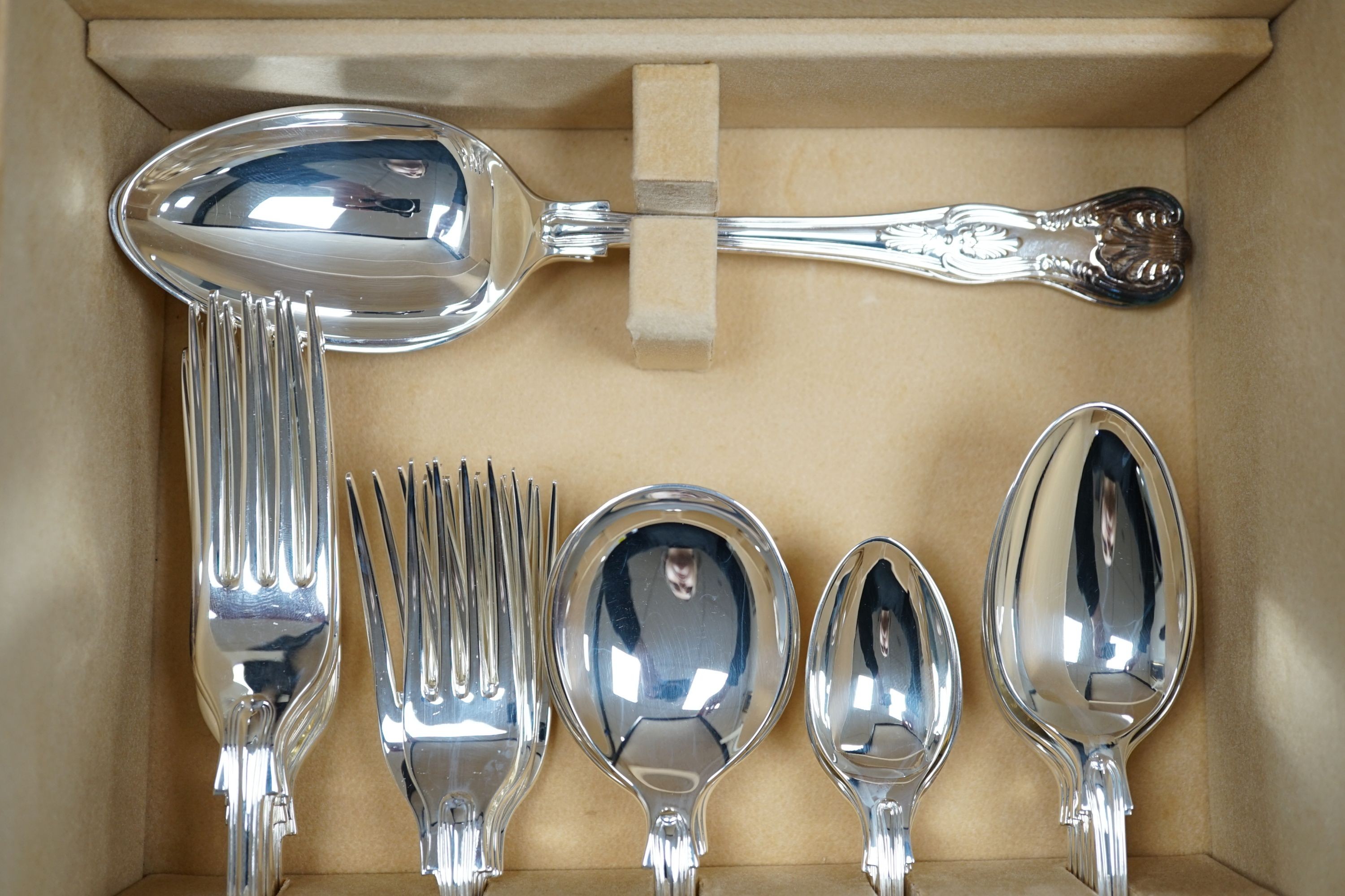 A cased modern silver forty four piece canteen of King's pattern cutlery by Mappin & Webb, Sheffield, 2004, weighable silver 76oz.